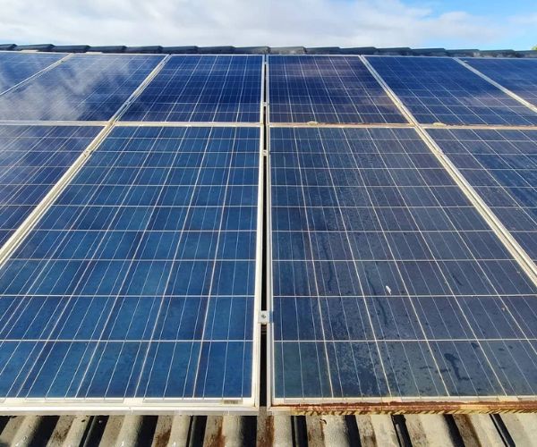 Before vs after power washing solar panels